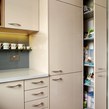 High gloss cashmere kitchen with built in storage