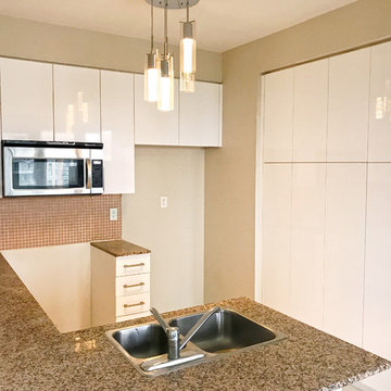 High-gloss custom kitchen cabinet refacing in Toronto