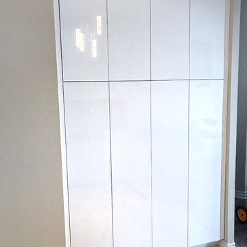 High-gloss custom kitchen cabinet refacing in Toronto