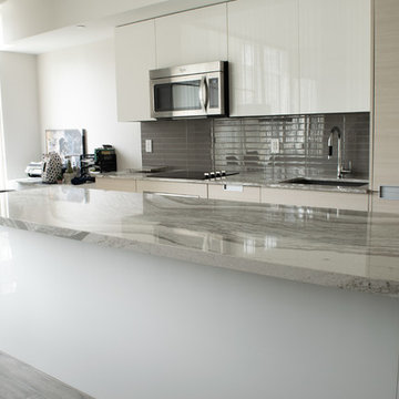 High-gloss kitchen with Cambria countertop
