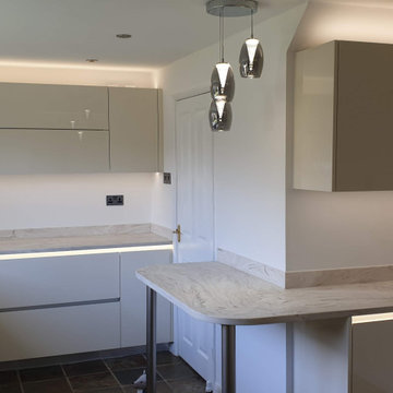High gloss modern style handleless kitchen.