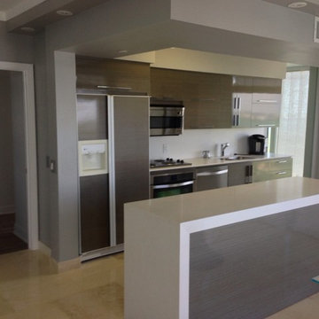 High gloss obeche veneer kitchen