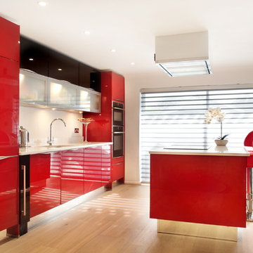 High gloss red kitchen with island