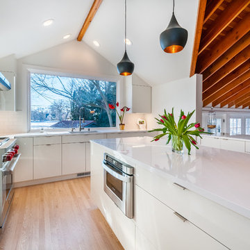 High Gloss White Cabinets in Kitchen with Exposed Wood Ceiling