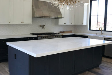 Medium tone wood floor kitchen photo in San Francisco