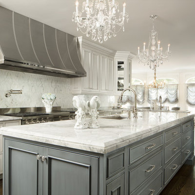 Example of a huge classic l-shaped dark wood floor and brown floor eat-in kitchen design in Chicago with an undermount sink, beaded inset cabinets, multicolored backsplash, stainless steel appliances, an island, gray cabinets, quartzite countertops and stone tile backsplash
