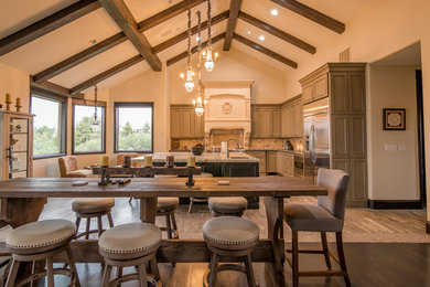 Example of a classic kitchen design in Denver with an island