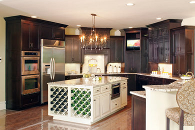 Kitchen - traditional kitchen idea in Other with granite countertops, ceramic backsplash and an island