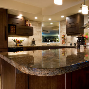 Small asian u-shaped eat-in kitchen in Hawaii with shaker cabinets, dark wood cabinets, granite benchtops, beige splashback, stone tile splashback, panelled appliances, marble floors and a peninsula.