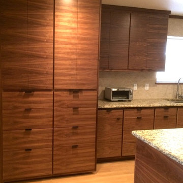 Horizontal Matched Grain Walnut Pantry with drawers