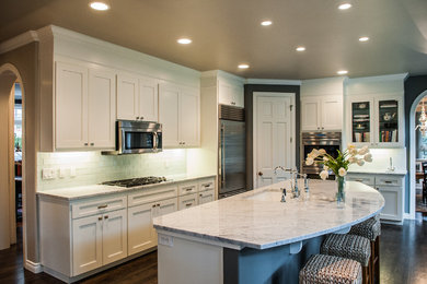 Elegant l-shaped open concept kitchen photo in Seattle with an undermount sink and shaker cabinets