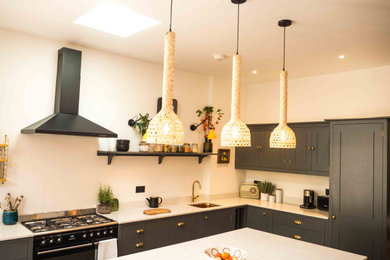 This is an example of a contemporary kitchen in Sussex.