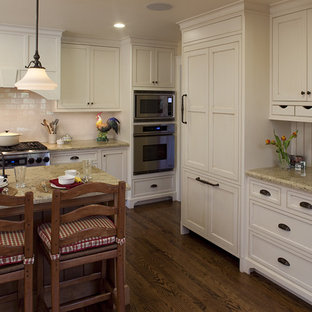 Rustic kitchen ideas - Example of a mountain style kitchen design in San Francisco with paneled appliances