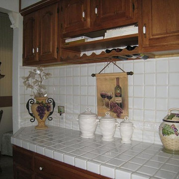 How to hang artwork in a kitchen with tiled walls.