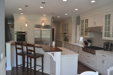 Kitchen - traditional kitchen idea in Chicago with beaded inset cabinets