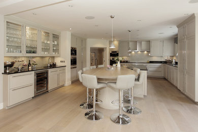 Example of a kitchen design in Surrey