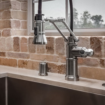 Industrial Style Faucet In Farmhouse Kitchen