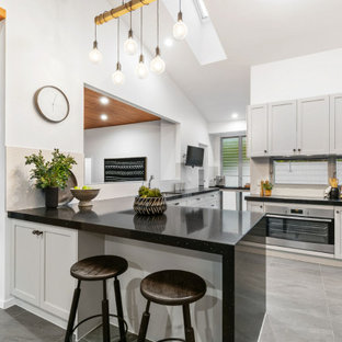 This is an example of a midcentury kitchen in Brisbane.