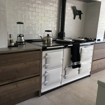 Industrial transitional kitchen with aga