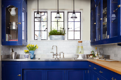 Kitchen - traditional kitchen idea in Chicago with blue cabinets