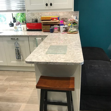 Inframe painted kitchen with central prep island