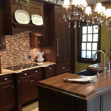 Inset walnut cabinets with wood top