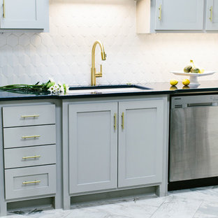 Design ideas for a mid-sized midcentury single-wall separate kitchen in Other with a single-bowl sink, shaker cabinets, grey cabinets, quartz benchtops, white splashback, ceramic splashback, stainless steel appliances, porcelain floors, no island, grey floor and blue benchtop.