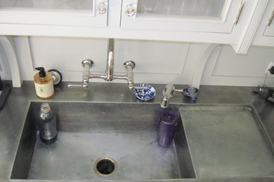 integral zinc sink w/ side drain board