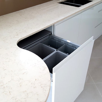 Integrated Bins in Modern White & Dark Elm Kitchen, Silestone Worktops & Gold Sp