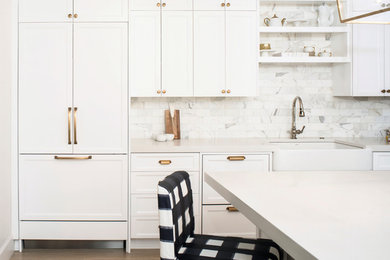 Inspiration for a shabby-chic style kitchen remodel in Portland with white cabinets and paneled appliances