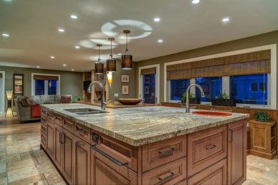 Example of a classic open concept kitchen design in Calgary