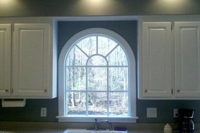 Kitchen - kitchen idea in Raleigh with beaded inset cabinets and white cabinets