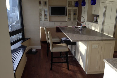Example of a mid-sized trendy u-shaped dark wood floor eat-in kitchen design in Chicago with recessed-panel cabinets, white cabinets, granite countertops and an island