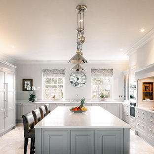Inspiration for a large traditional kitchen in Other with shaker cabinets, grey cabinets, an island, white worktops, grey splashback, glass sheet splashback and white floors.