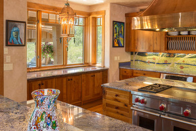 Eat-in kitchen - huge traditional medium tone wood floor eat-in kitchen idea in Denver with an undermount sink, recessed-panel cabinets, medium tone wood cabinets, granite countertops, blue backsplash, mosaic tile backsplash, stainless steel appliances and an island