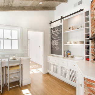 Inspiration for a timeless kitchen remodel in Los Angeles with open cabinets and white cabinets