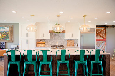 Inspiration for a transitional eat-in kitchen remodel in Salt Lake City with an island