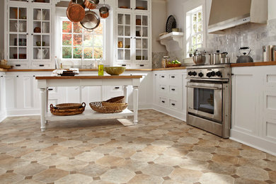 Inspiration for a timeless ceramic tile kitchen remodel in Other