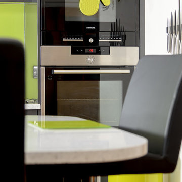 Jazz up your grey gloss kitchen with a zesty twist of lime