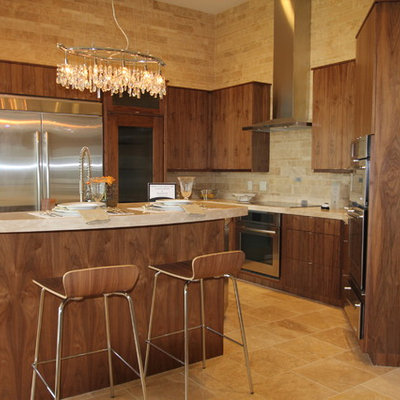 Example of a trendy kitchen design in Cedar Rapids with stainless steel appliances, flat-panel cabinets, medium tone wood cabinets, beige backsplash and travertine backsplash