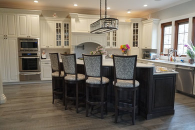 Example of a trendy kitchen design in New York with an island