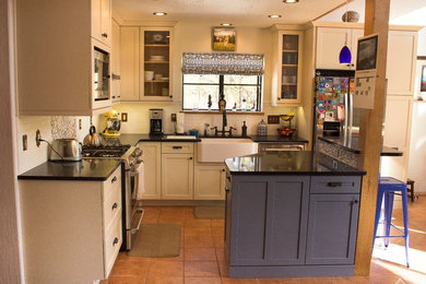 Example of a transitional kitchen design in Albuquerque