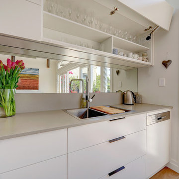 White Kitchen with mirror splashback