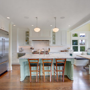 Photo of an arts and crafts kitchen in Seattle with marble benchtops and stainless steel appliances.