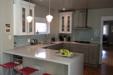 Inspiration for a coastal u-shaped cork floor open concept kitchen remodel in Toronto with an undermount sink, recessed-panel cabinets, gray cabinets and stainless steel appliances