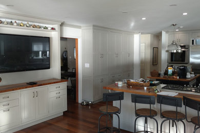 Inspiration for a huge modern galley eat-in kitchen remodel in Manchester