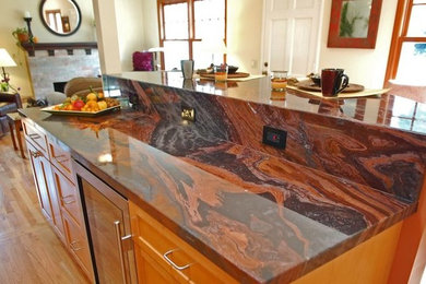 Mid-sized light wood floor kitchen photo in San Francisco with recessed-panel cabinets, light wood cabinets and marble countertops