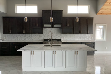 Eat-in kitchen - large transitional single-wall ceramic tile and white floor eat-in kitchen idea in Other with a double-bowl sink, shaker cabinets, white cabinets, marble countertops, white backsplash, marble backsplash, stainless steel appliances, an island and white countertops