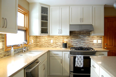 Trendy kitchen photo in Other with beige backsplash and stone tile backsplash