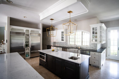 Large transitional beige floor eat-in kitchen photo in Philadelphia with a farmhouse sink, raised-panel cabinets, white cabinets, quartzite countertops, multicolored backsplash, marble backsplash, stainless steel appliances, two islands and multicolored countertops